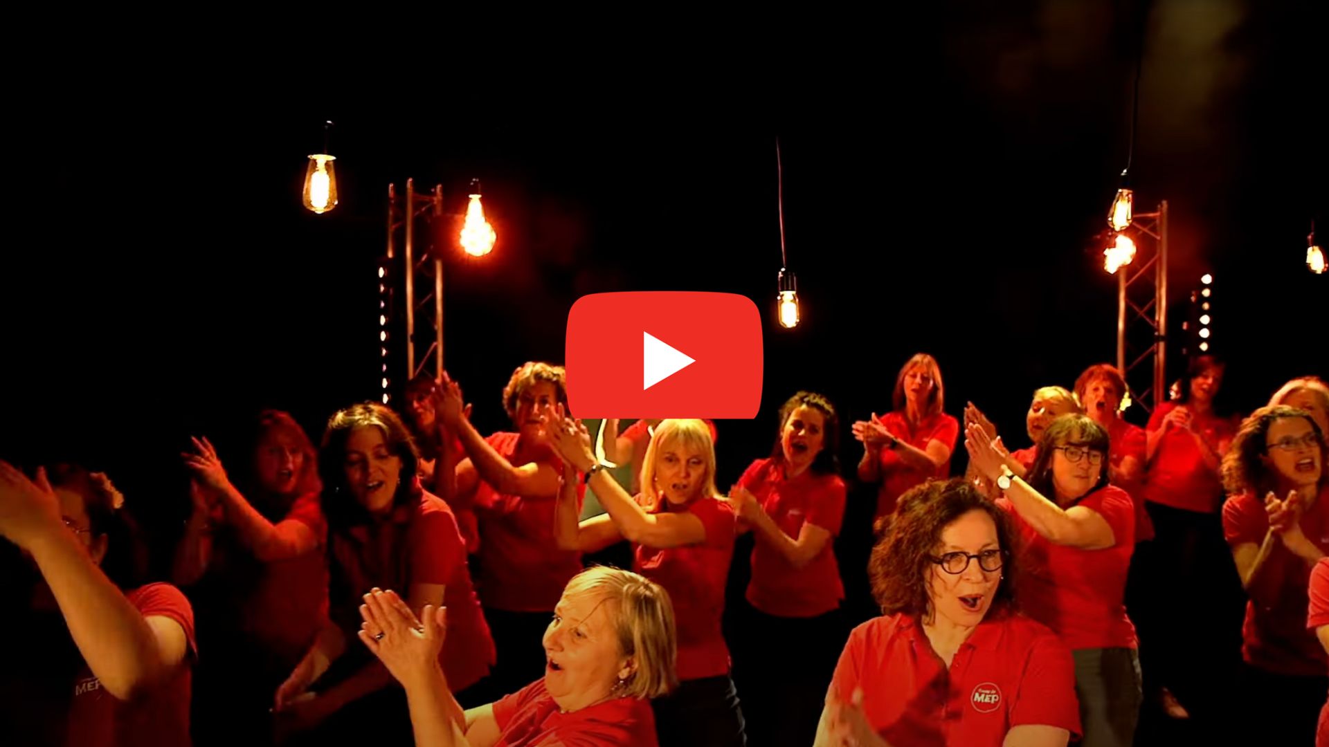 The MEP Women's Choir sings and dances in a performance of Sister Act's I Will Follow Him